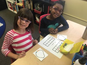 Building numbers from number words on tens frames and picture cards from our object boxes.